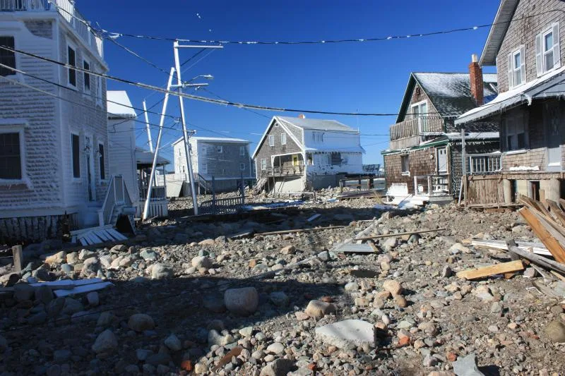Seawall stone and wreckage thrown between houses at Cedar Point after the February 2013 blizzard